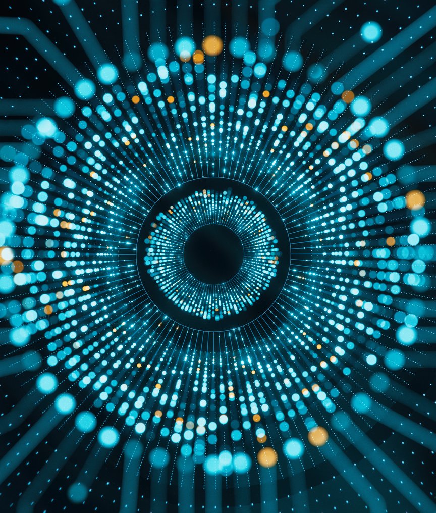 Network of glowing blue and orange dots arranged in a circular formation.